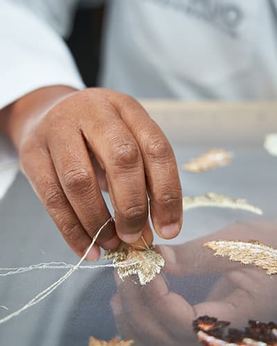 Broderie Main